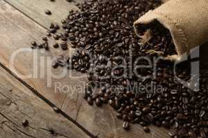 Fresh coffee beans on wood