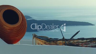 Slider Shot Featuring a Traditional Cycladic Urn, and Old Boat and the Aegean Mediterranean Sea