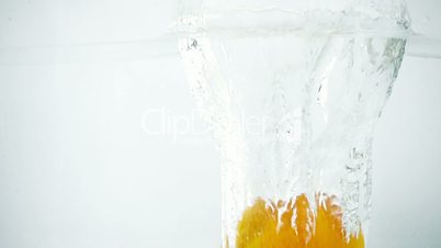 Tangerines Being Thrown into Water in Ultra Slow Motion