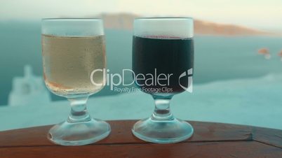 Slider Shot of Two Glasses with Wine in a Mediterranean Island