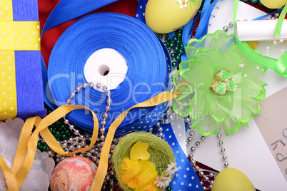 Easter background with eggs, ribbons and spring decoration