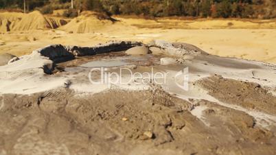 Ultra Close-up Shot of a Mud Volcano in a Remote Village