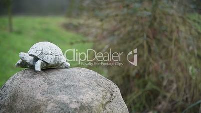 Sculpture of a turtle on a rock