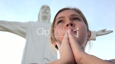 Praying At Jesus Statue