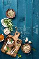 culinary background with spices on wooden table