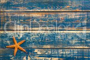 Wooden background with starfish