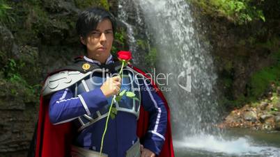 Romantic Cosplay Prince With Red Rose