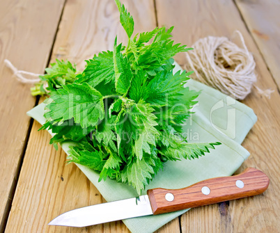 Nettle with napkin and twine on board
