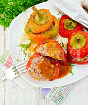 Pepper stuffed meat and rice with sauce in plate