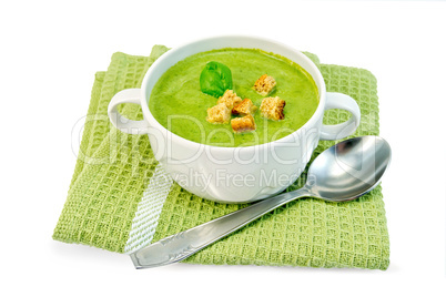 Soup puree with spinach and napkin