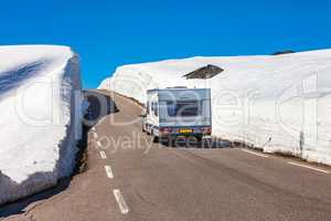 Caravan car travels on the highway.