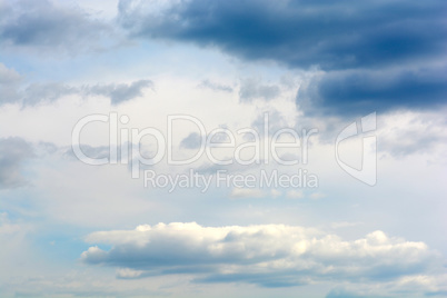 blue sky background with tiny clouds