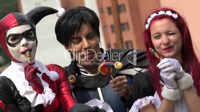 Teens Wearing Halloween Costumes With Candy