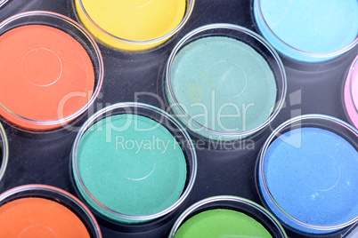 set of watercolor paints close up