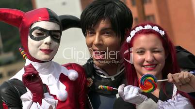 Happy Cosplay Friends With Lollipops