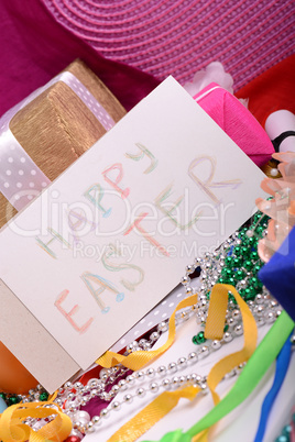 Easter background with eggs, ribbons and spring decoration