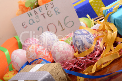 Easter background with eggs, ribbons and spring decoration