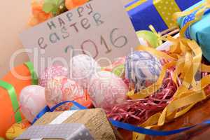 Easter background with eggs, ribbons and spring decoration