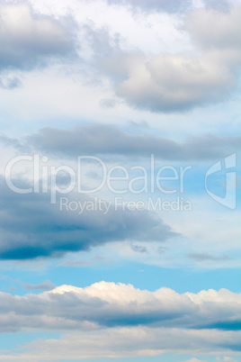 blue sky background with tiny clouds