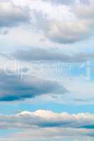 blue sky background with tiny clouds