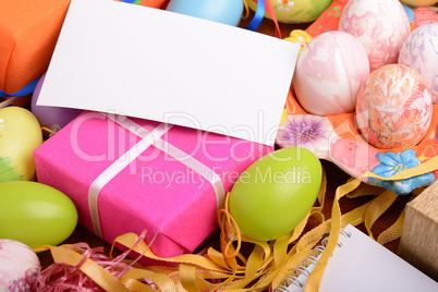 Easter background with Easter eggs and gift box