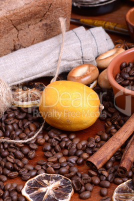 Vintage still life with coffee beans on wooden background