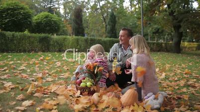 Happy family having fun outdoors in park