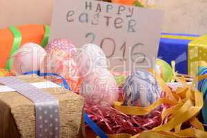 Easter background with eggs, ribbons and spring decoration