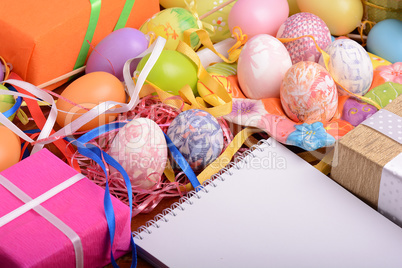 Easter background with eggs, ribbons and spring decoration