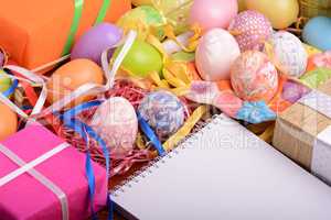 Easter background with eggs, ribbons and spring decoration