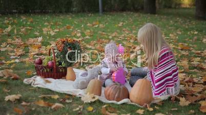 Two Sisters in the Autumn Park