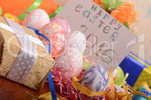 Easter background with eggs, ribbons and spring decoration