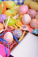 Easter background with eggs, ribbons and spring decoration