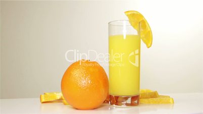 orange and orange juice rotation on the table