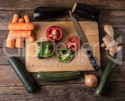 MIxed colorful vegetables on board, from overhead flat lay