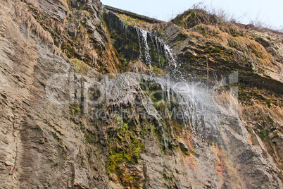 High waterfall on a cliff