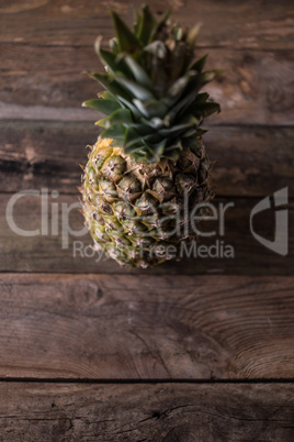 pineapple on wooden background