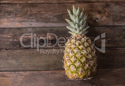 fresh pineapple on wood