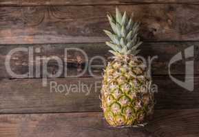 fresh pineapple on wood
