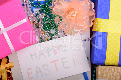 Easter background with eggs, ribbons and spring decoration