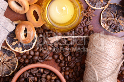 Vintage still life with coffee beans on wooden background