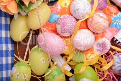 Easter background with eggs, ribbons and spring decoration