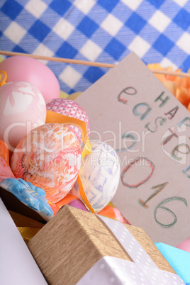 hand made eggs at a gift box, happy easter invitation card