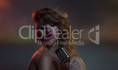 naked woman with retro mic