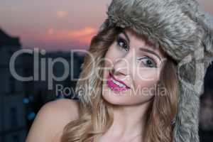 pretty woman wearing fur hat