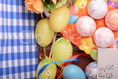 Happy Easter invitation card, hand made eggs at a gift box