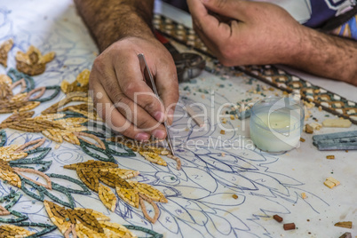 Master make artistic mosaics. Mosaic in Jordan
