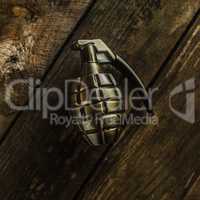 hand grenade on wood