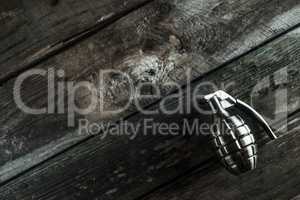 hand grenade on wood