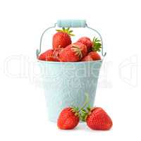 Strawberries in a bucket isolated on a white background